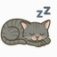 Sleeping Oscar mascot — rested and ready to travel.